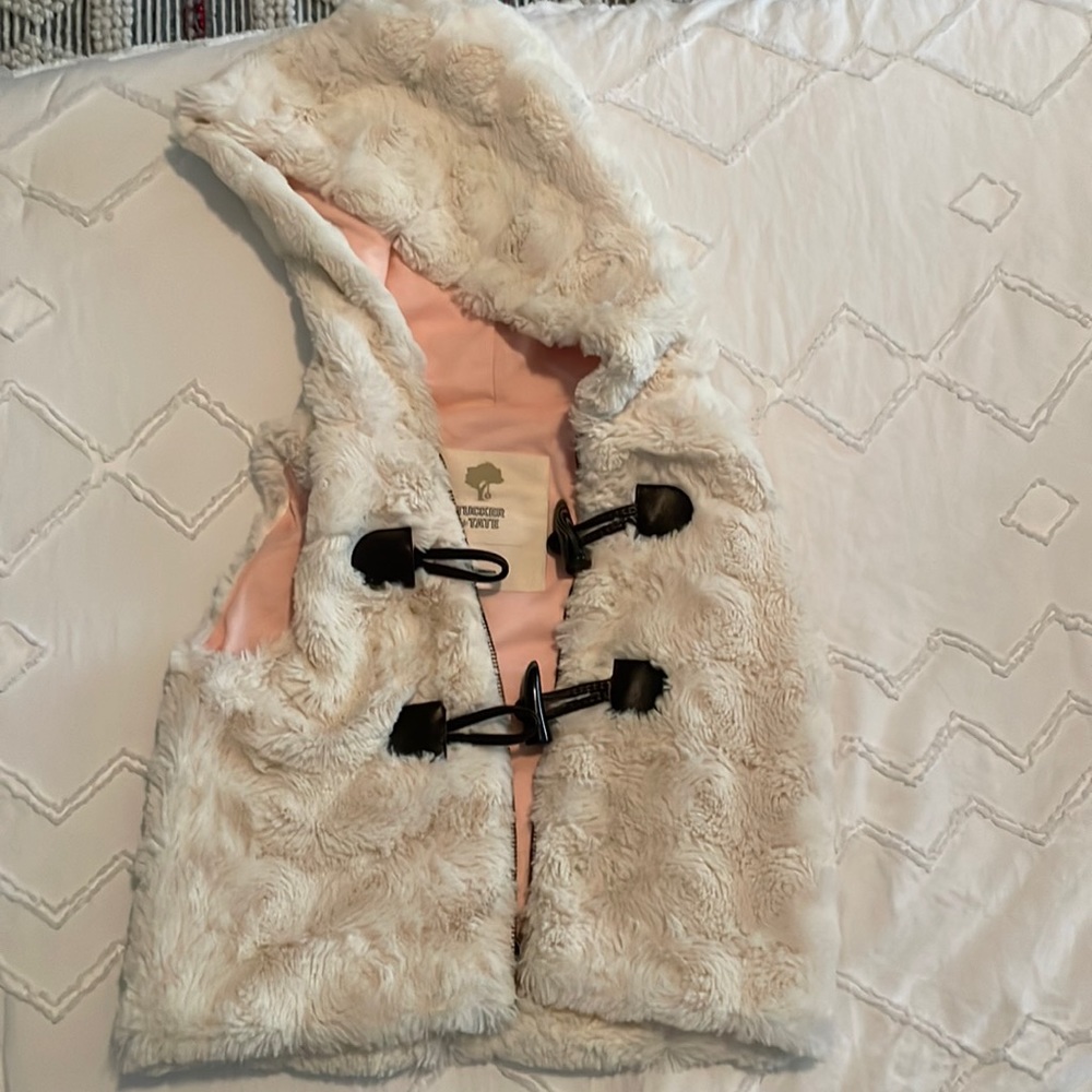 Tucker and Tate furry vest